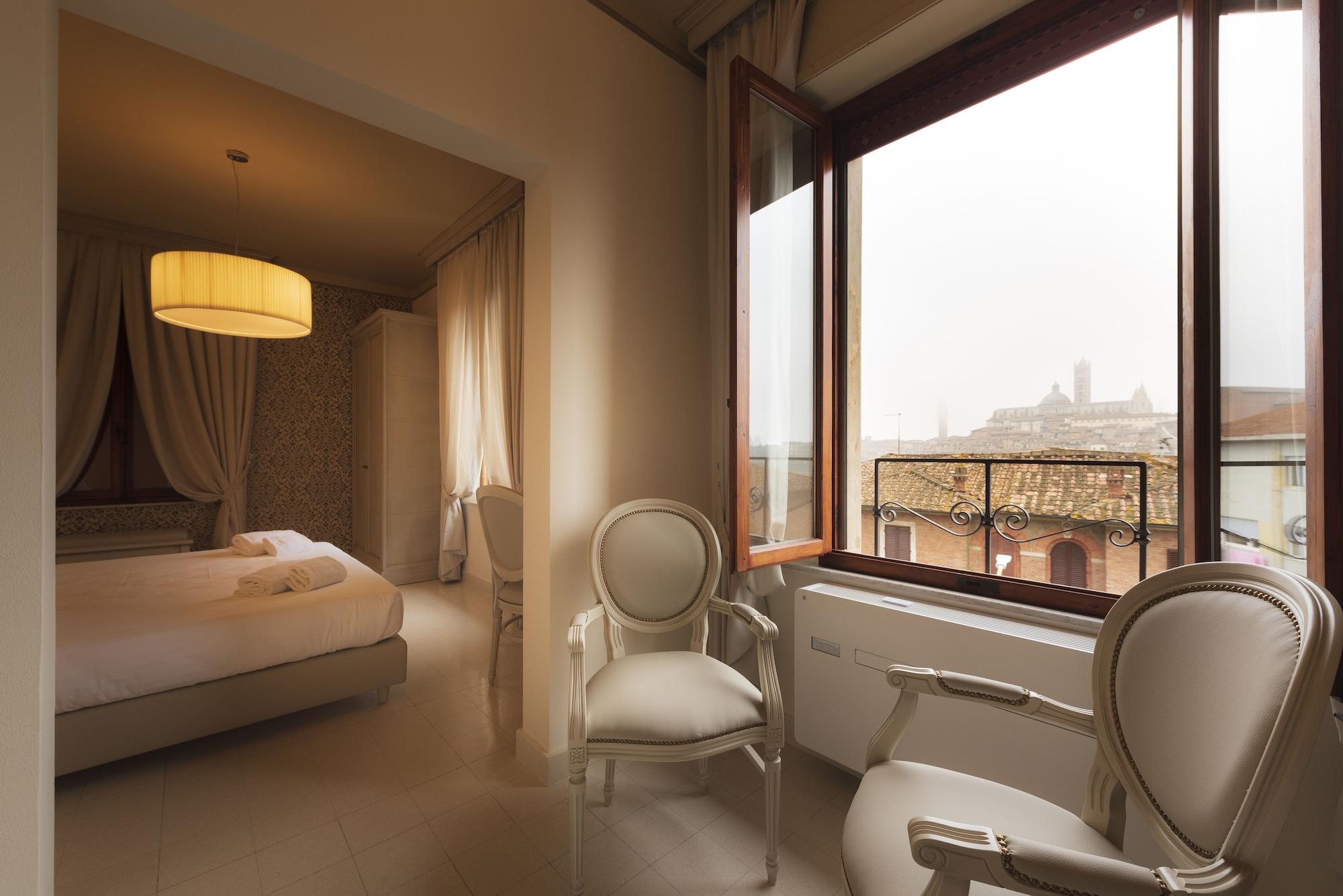 Villa Elda Boutique Hotel Siena Esterno foto
