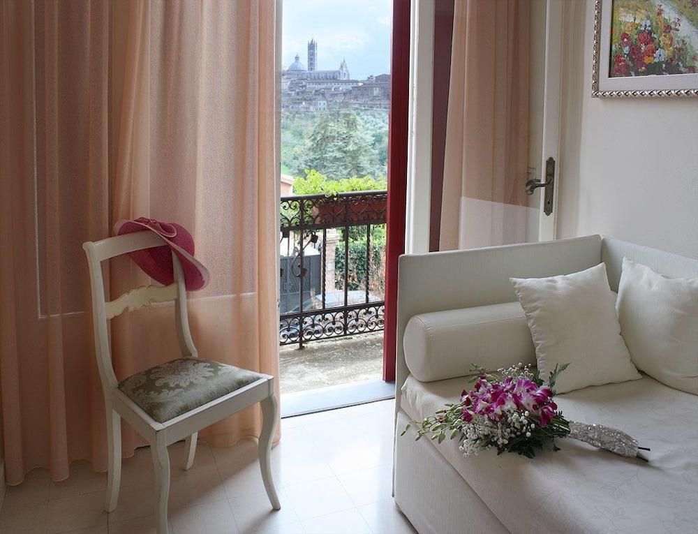 Villa Elda Boutique Hotel Siena Esterno foto